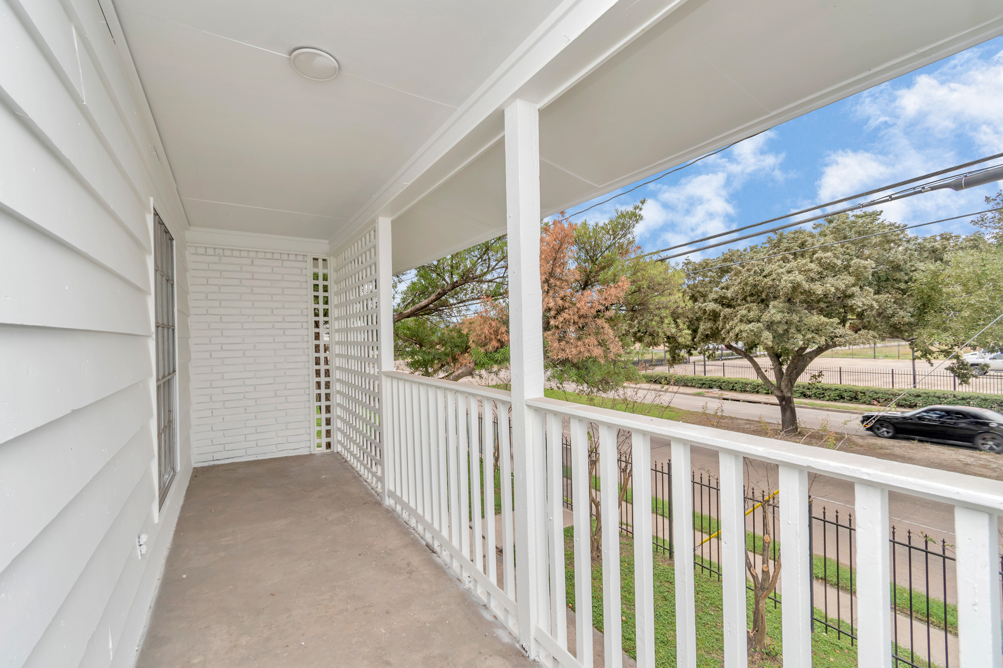 Affordable Houston apartment complex with modern design, spacious balconies, and well-maintained landscaping, offering budget-friendly housing options in a convenient urban location.